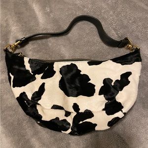 UO Cow Print Shoulder Bag